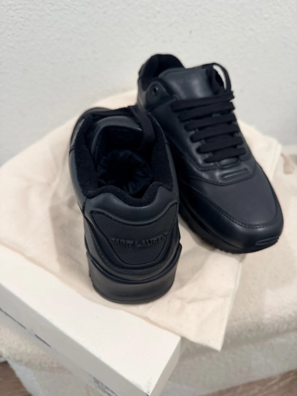 Saint Laurent All-Black Leather Sneakers - Picture 3 of 5